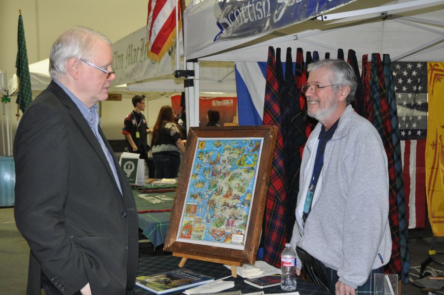 Former Pres. Larry Duncan speaks to a guest.